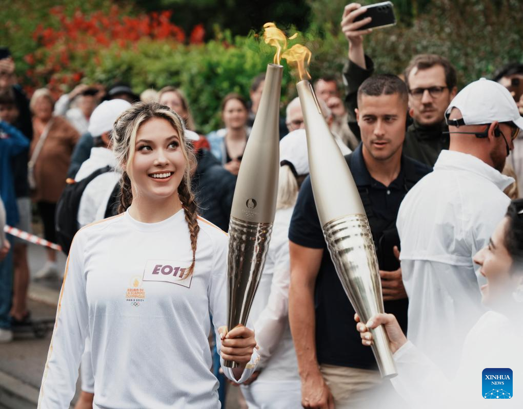 image 47 Gu Ailing participates in Paris 2024 torch relay