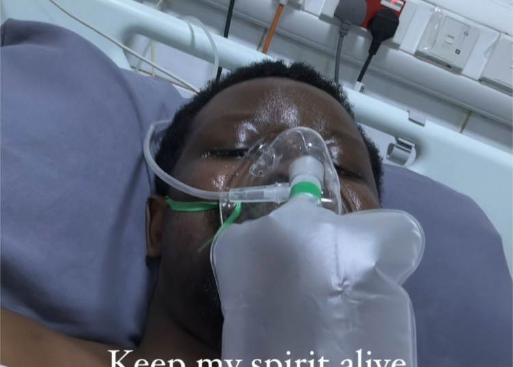 EF282B3F 4570 4A49 92E9 40C272432D82 TG Omori, a popular Nigerian singer and songwriter, has made a public plea for help after a failed kidney transplant. In a heart-wrenching video shared on social media, Omori can be seen lying in a hospital bed, looking weak and frail.