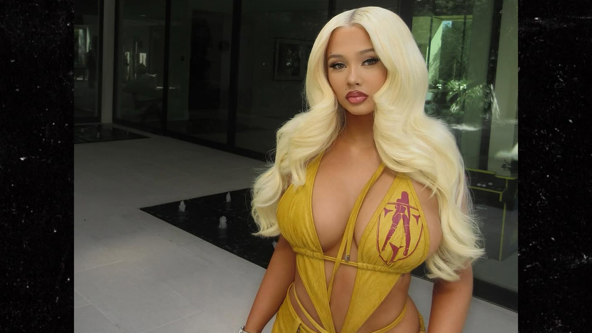 Alabama Barker Wears Revealing Yellow Dress to Coachella