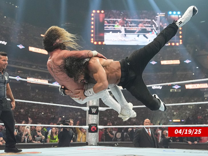 Roman Reigns yells during his Triple Threat match against CM Punk and Seth Rollins getty 3