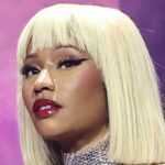 Bella Hadid Stuns in Red Leather Catsuit in Paris on ‘The Beauty’ Set