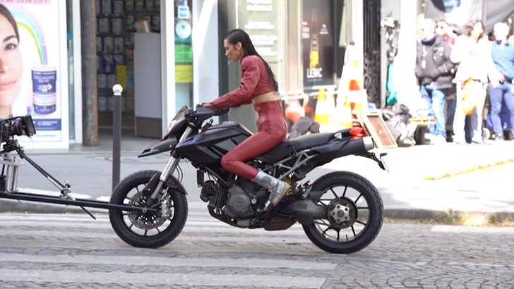 Bella Hadid Stuns in Red Leather Catsuit in Paris on 'The Beauty' Set 041025_bella_hadid_kal