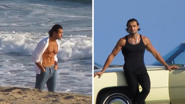 Sam Asghari Shows Off Rock-Hard Abs in Steamy Malibu Beach Photo Shoot sam-asghari-kal-05-30-2025