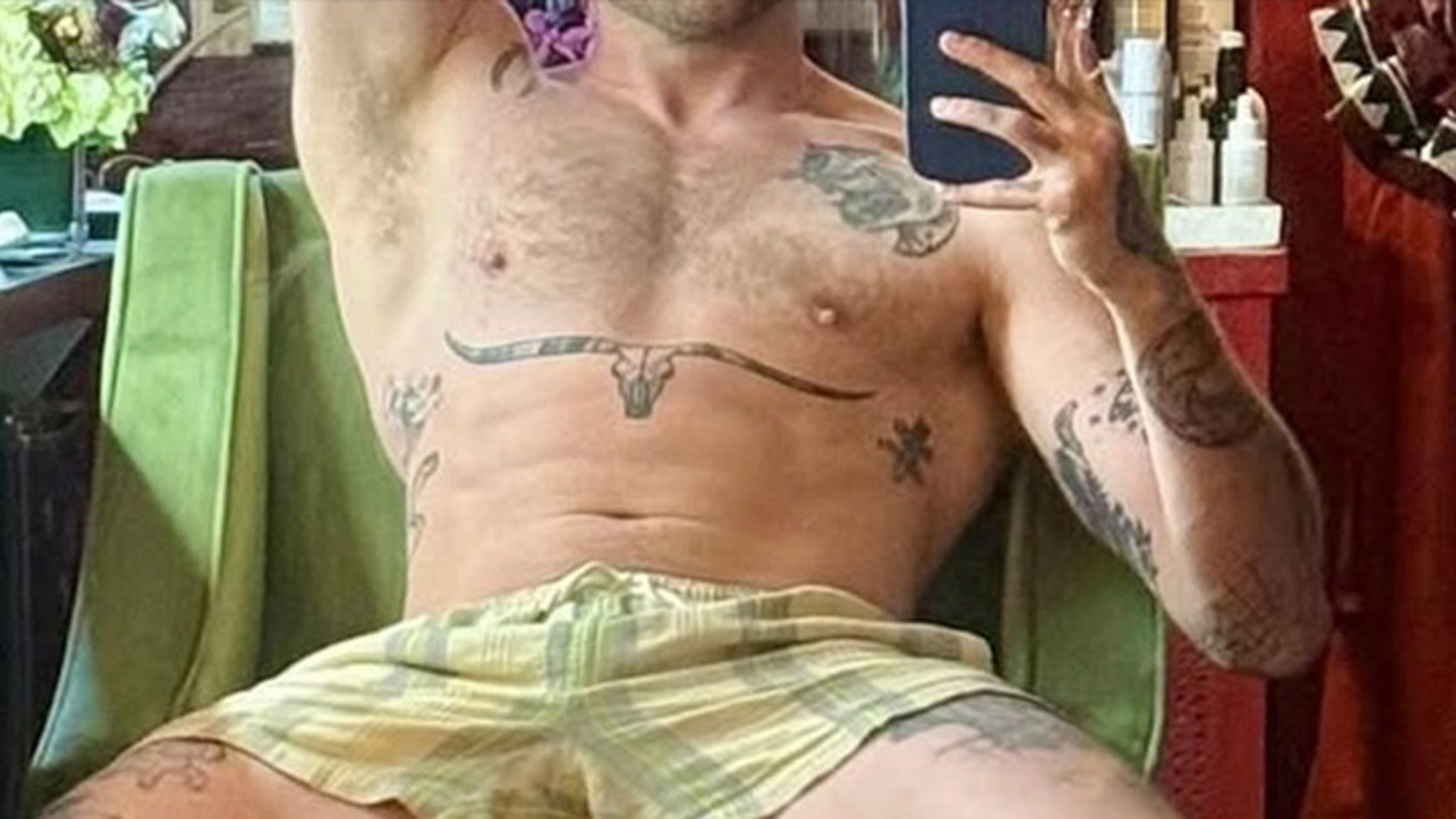 Guess the Shirtless Singer in This Grizzly Shot