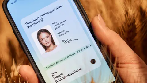 Why it has one of the most digital governments Ministry for Digital Transformation Ukraine A phone showing a document on the Diia app