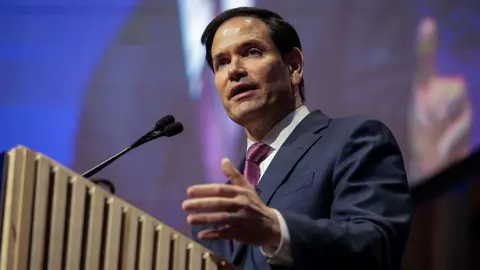 What is the Strait of Hormuz and why does it matter? Getty Images U.S. Secretary of State Marco Rubio speaks at a lectern