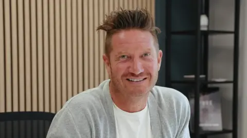 Should you be eating food products with fewer ingredients? IND!E Matthew Hopkins, founder of IND!E, with spiky hair