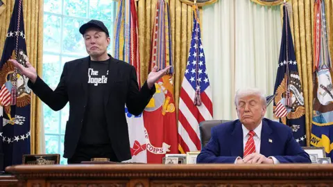 Tesla shares hit as Trump-Musk feud explodes Getty Images Tesla CEO Elon Musk speaks alongside U.S. President Donald Trump to reporters in the Oval Office of the White House on May 30, 2025 in Washington, DC. Musk, who served as an adviser to Trump and led the Department of Government Efficiency, announced he would leave his role in the Trump administration to refocus on his businesses.