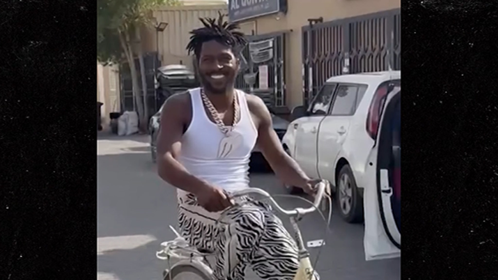 Antonio Brown All Smiles On Bike Ride Despite Arrest Warrant