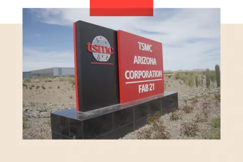 The US factory that lays bare the contradiction in Trump's policy A black and red sign sits in the middle of the desert. On the sign it says 'TSMC Arizona, Corporation, Fab 21'.