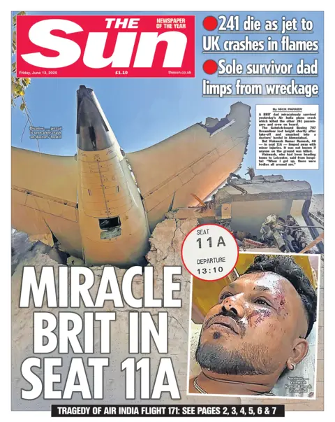 The headline on the front page of The Sun reads: "The miracle of seat 11A".