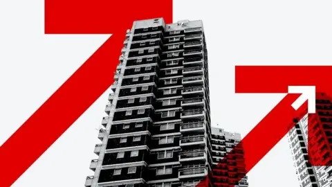 When will interest rates go down again and how do they affect mortgages? BBC Stylised image of a tower block of flats with red and white arrows superimposed on top