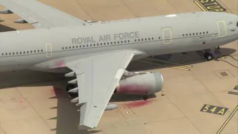 Palestine Action to be banned after RAF base break in BBC Red paint is seen on and around a Royal Air Force plane