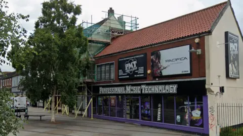 Norwich music store closure brings fear for industry's future Google Maps The outside of the Professional Music Technology store in Norwich. It has a large sign with the stores title, and purple borders around the window. There is a tree to the left of it.