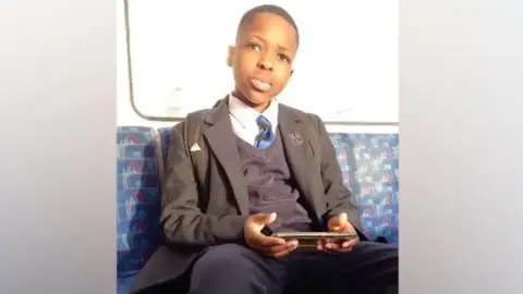 Murder accused Marcus Monzo wanted to kill, court told Metropolitan Police Daniel Anjorin pictured sitting on a bus wearing school uniform