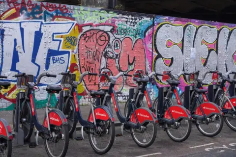 Lime bikes dumped in canals and rivers 'posing pollution risk' Getty Images A docking station with Santander Cycles on Brick Lane on the 20th of January 2024, London