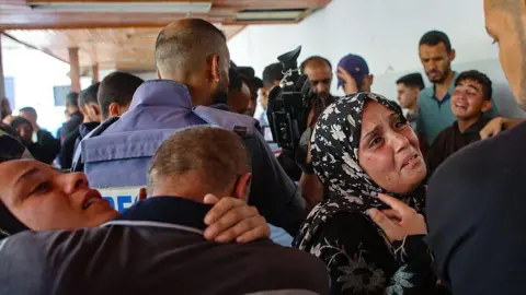 Three journalists among five killed in Israeli strike on Gaza hospital AFP Relatives mourn three Palestinian journalists who were among five people killed in an Israeli strike on the compound of al-Ahli hospital, in Gaza City, on 5 June 2025