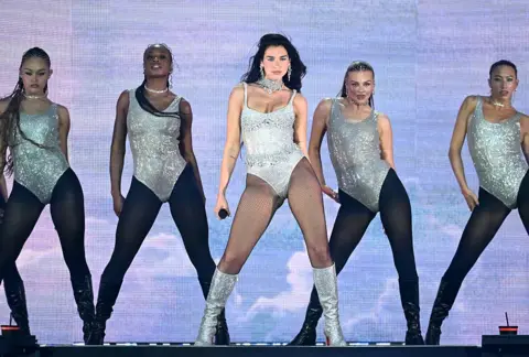 Dua Lipa brings out Jamiroquai at emotional Wembley debut Getty Images Dua Lipa and her dancers stand in formation during her show at Wembley Stadium