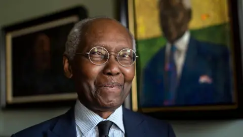 Sir Geoff Palmer, Scotland's first black professor, dies aged 85 PA Media Sir Geoff Palmer, wearing a suit, glasses and with white hair, stands in front of a portrait of himself.