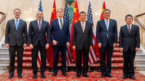 US-China talks end with plan for Trump and Xi to approve Getty Images US Treasury Secretary Scott Bessent and Chinese vice premier He Lifeng pose for a photo with US Trade Representative Jamieson Greer, U.S. Secretary of Commerce Howard Lutnick, Chinese Commerce Minister Wang Wentao, and China's International Trade Representative and Vice Minister of Commerce Li Chenggang, in London on 9 June, 2025.