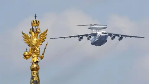 Are the surprise airfield attacks a turning point for Ukraine? Getty Images A Beriev A-50 plane flies over a golden statue in Red Square during a military parade in 2020