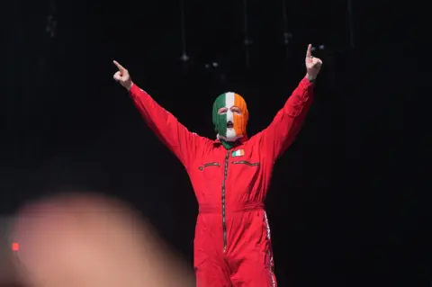 Charli, Neil Young and Scissor Sisters give Glastonbury goosebumps PA Media DJ Provaí of Kneecap