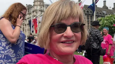 MPs back assisted dying bill in historic Commons vote Pamela has a short, dark blonde bob and wears a flamingo pink Dignity in Dying campaign tee-shirt