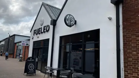 Uttoxeter coffee shop could shut over high rates, owner says The outside of Fueled coffee shop. it is a primarily white building with Fueled in big letter across the top of the front door. There is also some seating out the front of the shop as well as an A-board used for advertising.