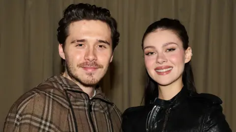 Can the Beckham brand survive reports of family feud? Getty Images Brooklyn Peltz-Beckham, Nicola Peltz-Beckham at the Burberry Fall RTW 2025 fashion show as part of London Fashion Week on February 24, 2025 in London, United Kingdom.