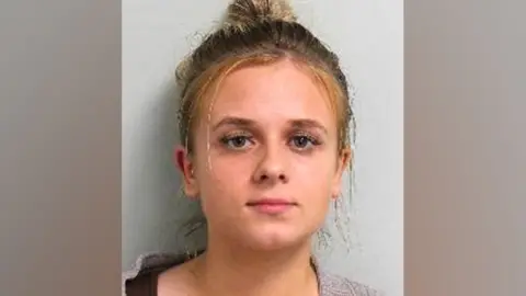 Nursery worker Roksana Lecka convicted of abusing 21 babies Metropolitan Police Custody image of Roksana Lecka. She is looking directly at the camera wearing a woollen type cardigan.