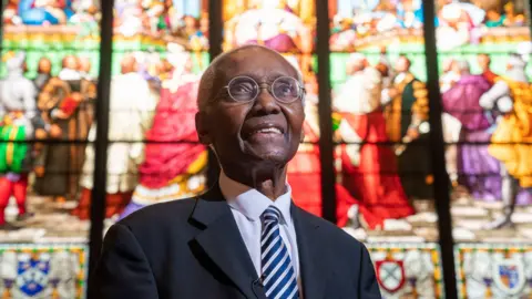 Sir Geoff Palmer, Scotland's first black professor, dies aged 85 PA Media Sir Geoff Palmer, wearing a suit, glasses and with white hair, standing in front of a plate glass mural