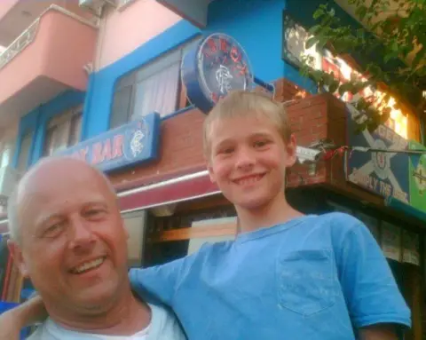 Dad gave me a kidney so I can have my dream wedding Brian Innes Brian Innes has his young son in his arms while on holiday. They are tanned and smiling and both have light blue tops on.