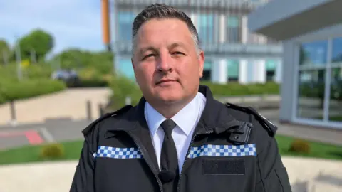 Talbot Green police station attacker jailed for attempted murder Chief Superintendent Stephen Jones, from South Wales Police is wearing his police uniform and looking straight at the camera.
