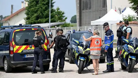 School killings leave stunned Austria and France searching for answers JEAN-CHRISTOPHE VERHAEGEN/AFP French gendarmes control the access to a secondary school after a 31-year-old teaching assistant was stabbed with a knife by a 15-year-old pupil during a bag search in Nogent, eastern France, on June 10, 2025
