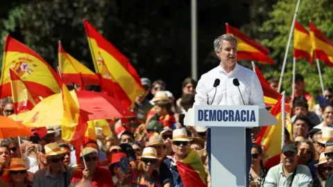 Spain's Sánchez sorry for corruption scandal as opposition calls for resignation Reuters Alberto Nunez Feijoo, the leader of the People's Party, speaks during a protest against Spanish Prime Minister Pedro Sanchez's government, under the slogan 'Mafia or Democracy' in Madrid,