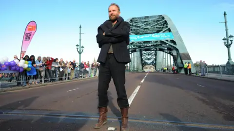 Governments have neglected the North East for decades PA Sting poses for photographers on the Tyne Bridge before starting the Great North Run in Newcastle in 2009