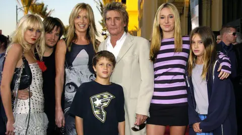 'I wish they wouldn't call it the tea time slot' Getty Images Rod Stewart with five of his eight children, and future wife Penny Lancaster at the 2003 American Music Awards