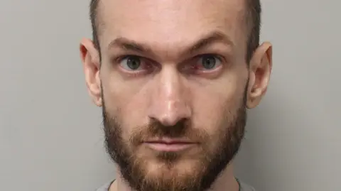 Hainault sword attacker jailed for life for murdering schoolboy Met Police A mugshot of Marcus Arduini Monzo who has been found guilty at the Old Bailey of murdering 14-year-old Daniel Anjorin. He is wearing a grey jumper and is starring directly at the camera with a fuzzy beard