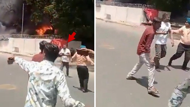 Indian Jet Crash's Sole Survivor Seen on Phone Walking Away From Wreck, New Video 061625_crash_survivor_kal