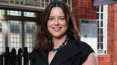 Michelle Ryan returns as Zoe Slater after 20 year gap BBC/Jack Barnes Michelle Ryan is smiling on the set of EastEnders, she is stood in front of Walford tube station