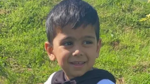 NHS failed to hear concerns of family in death of five-year-old boy Family handout/PA MEDIA A young boy with short brown hair smiles as he looks away from the camera