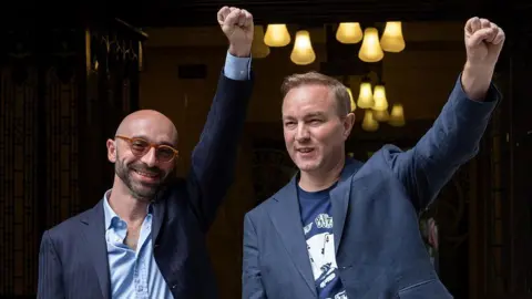City rate-rigging convictions quashed - what happens next? Bloomberg via Getty Images Carlo Palombo and Tom Hayes raise their fists in celebration outside the Supreme Court in London.