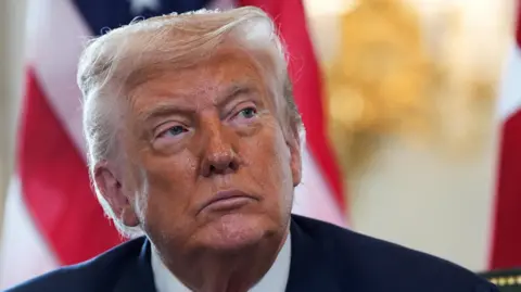 Donald Trump continues feud with Sadiq Khan calling him a nasty person Reuters A close up of Donald Trump with the US flag in the background.