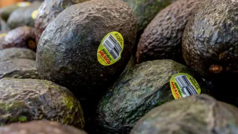 Six things that could get more expensive for Americans under Trump tariffs Getty Images Mexican avocados at a grocery store in San Francisco, California, US.