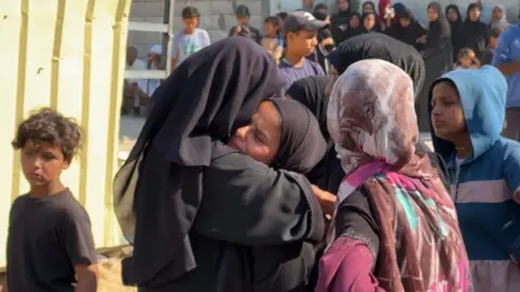 Gaza aid site offered a 'women only' day. It didn't stop the killing BBC Mary Sheikh al-Eid's family is comforted after her body is brought to Nasser Hospital in Khan Younis, southern Gaza (24 July 2025)
