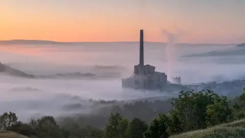 Peak Cluster carbon capture project 'could boost hundreds of jobs' Wesley Kristopher A cement works in the Hope Valley on a misty morning