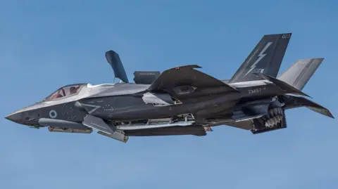 Getty Images A Royal Air Force F-35b fighter jet in flight