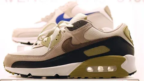 How Trump's tariff chaos is reshaping Asia's businesses Getty Images Nike trainers on display at one of the company's shops on Fifth Avenue, New York City on 3 April, 2025.