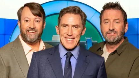 Which stars are missing, and why? David Mitchell, Rob Brydon and Lee Mack on the set of Would I Lie To You>