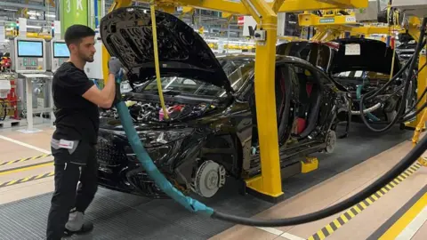 Five things that could get more expensive for Americans under Trump tariffs Reuters An employee of German car manufacturer Mercedes-Benz works on a Mercedes CLA class model at the production line at the factory in Rastatt, Germany.